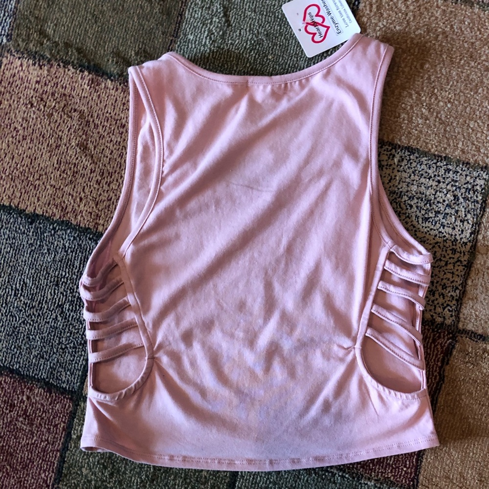 Pink crop top with cross-cross peep on sides